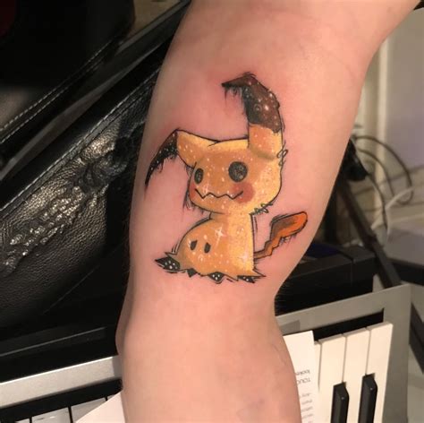 It wears a rag fashioned into a Pikachu costume in an effort to look less scary. . Mimikyu tattoo